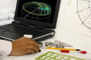 Man designing tank gui laptop